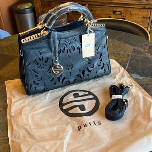 Segolene Paris laser cut leather bag.